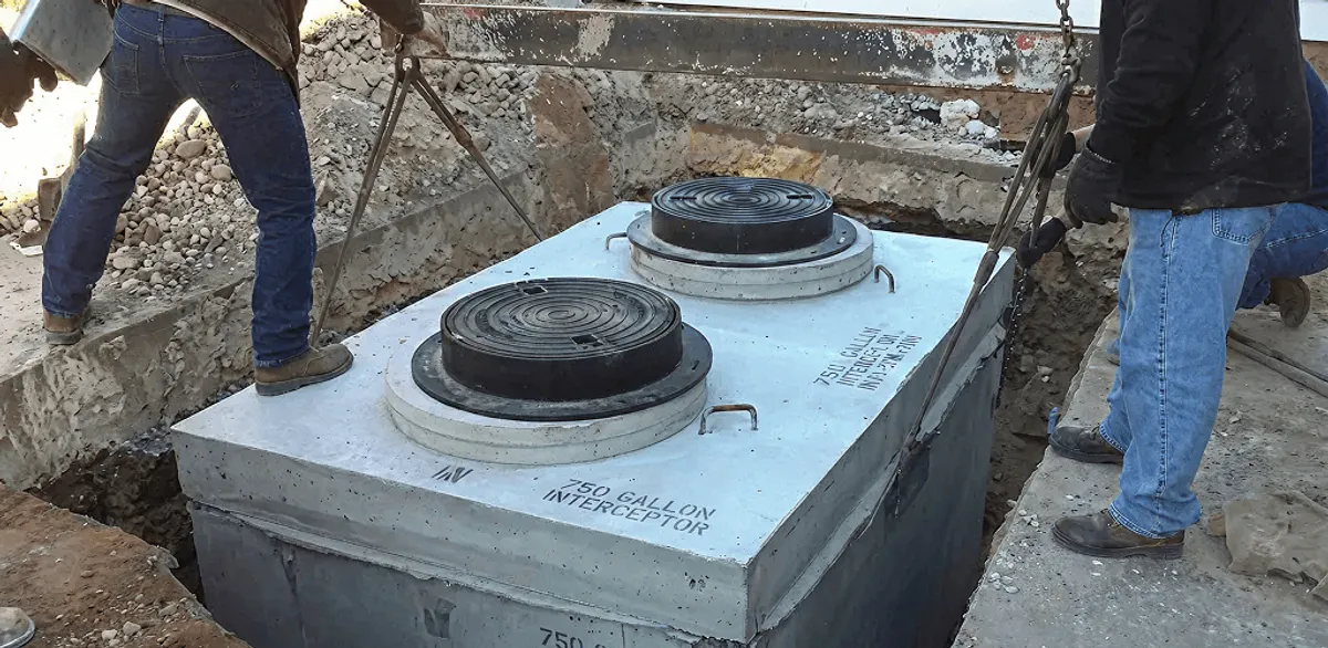 Grease trap installation for a commercial property drainage system in Tallahassee, FL